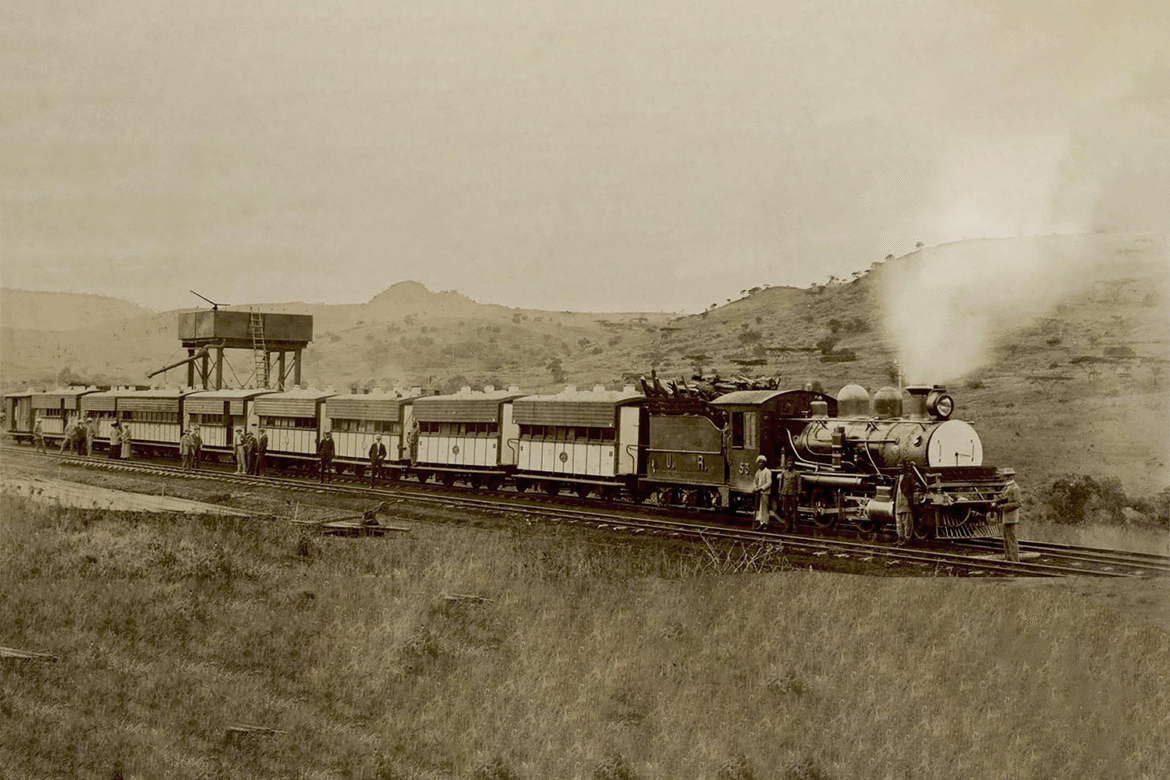 An old picture of a locomotive train travelling to Kenya-Uganda railway