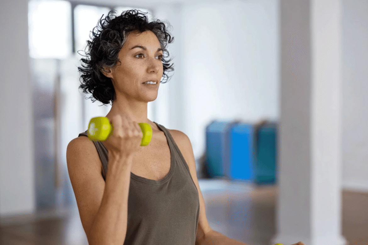 Picture of and adult woman lifting weights