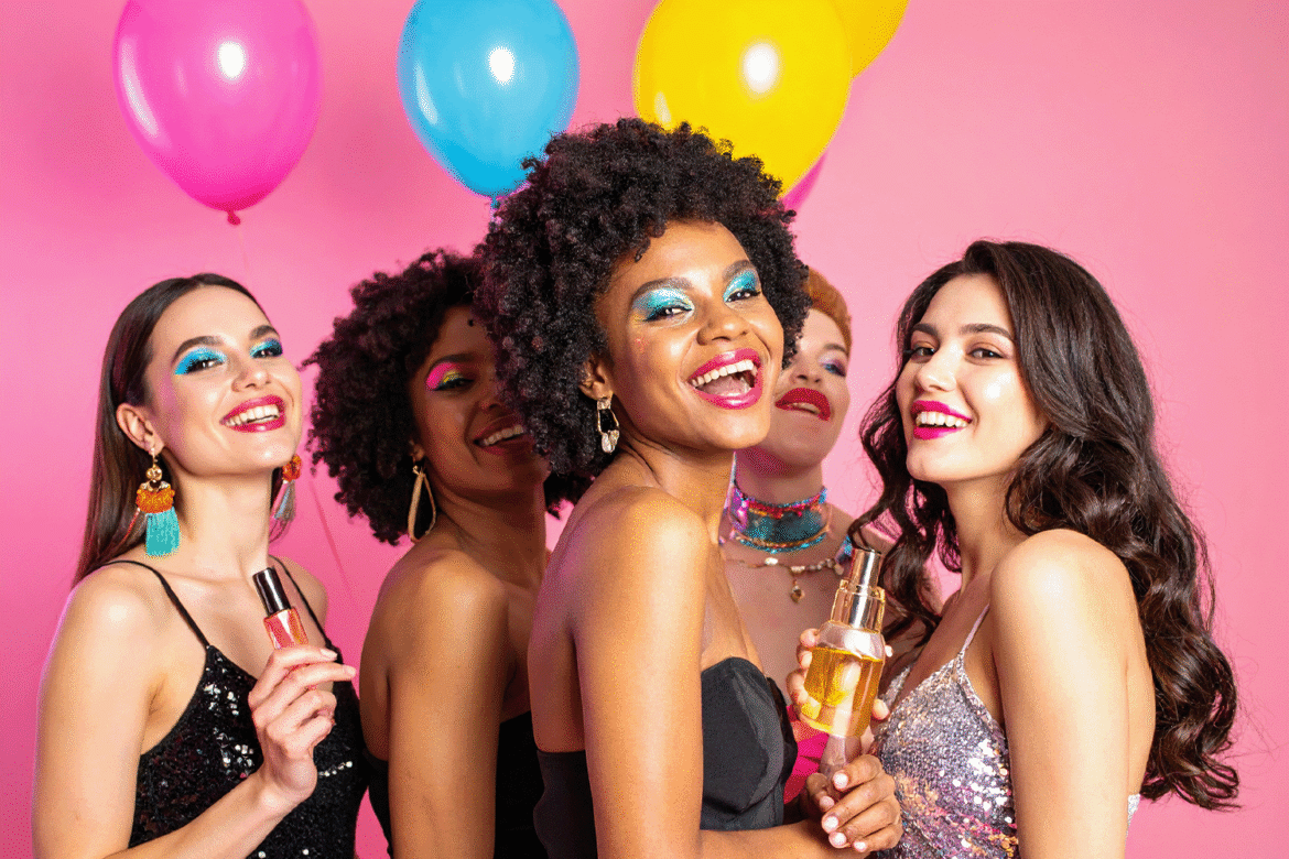 A picture of five beatutiful ladies advertising a perfume brand